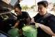 Michelle Carpenter (right), owner of Restaurant Beatrice, and Kimberly High, executive director of Joppy Momma’s Farm, load compost in 2025. Beatrice in Oak Cliff is expected to close June 7, 2026. It was open for four years.